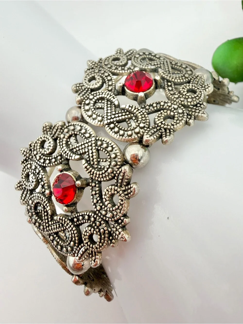 Vintage-Inspired Silver Tone Bracelet with Red Crystal Accents